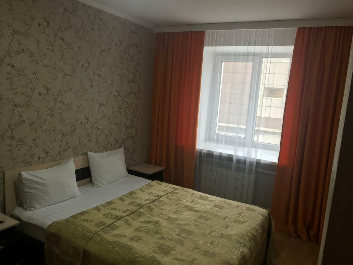 City Hotel Öskemen Bagian luar foto
