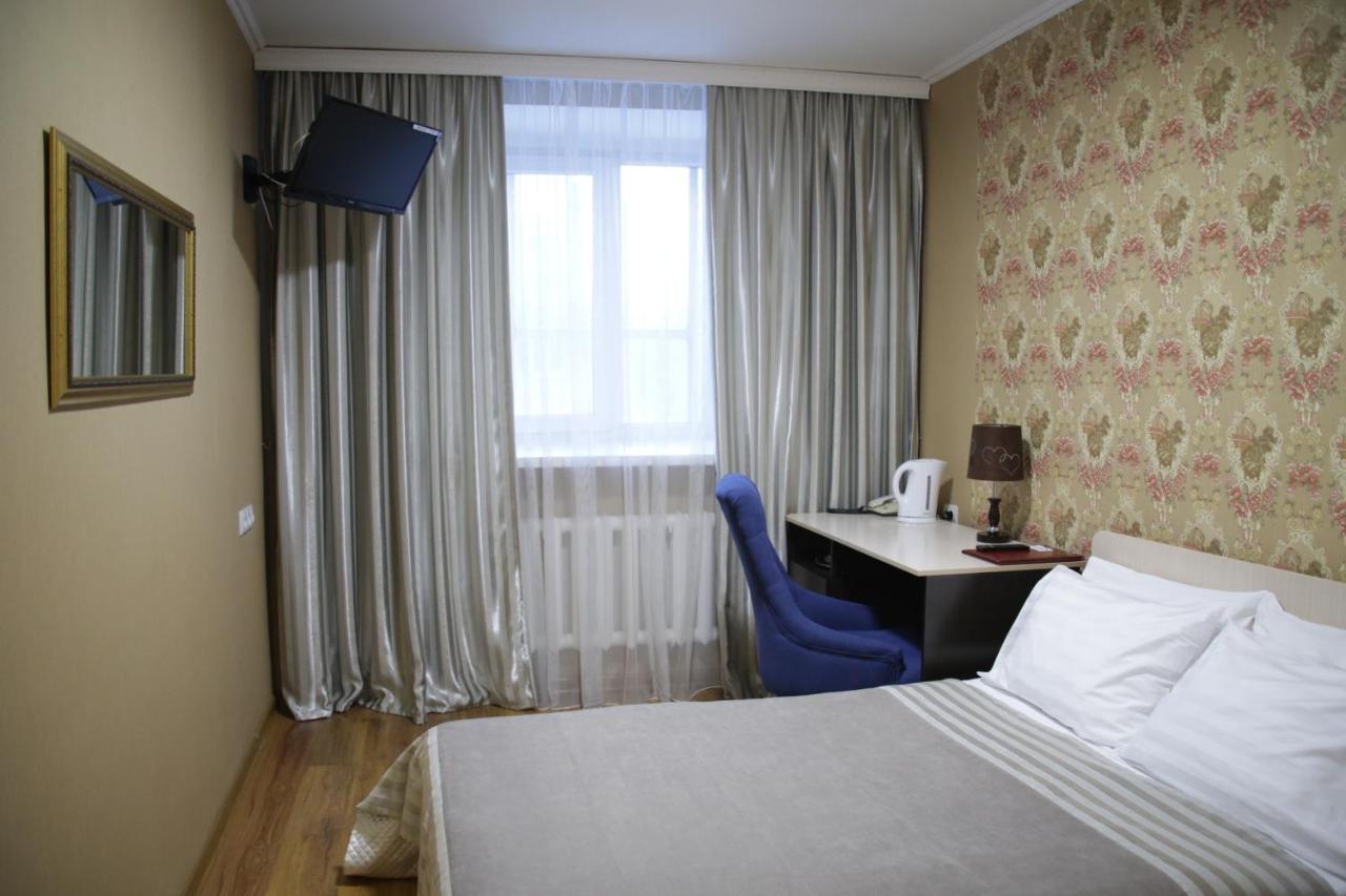 City Hotel Öskemen Bagian luar foto