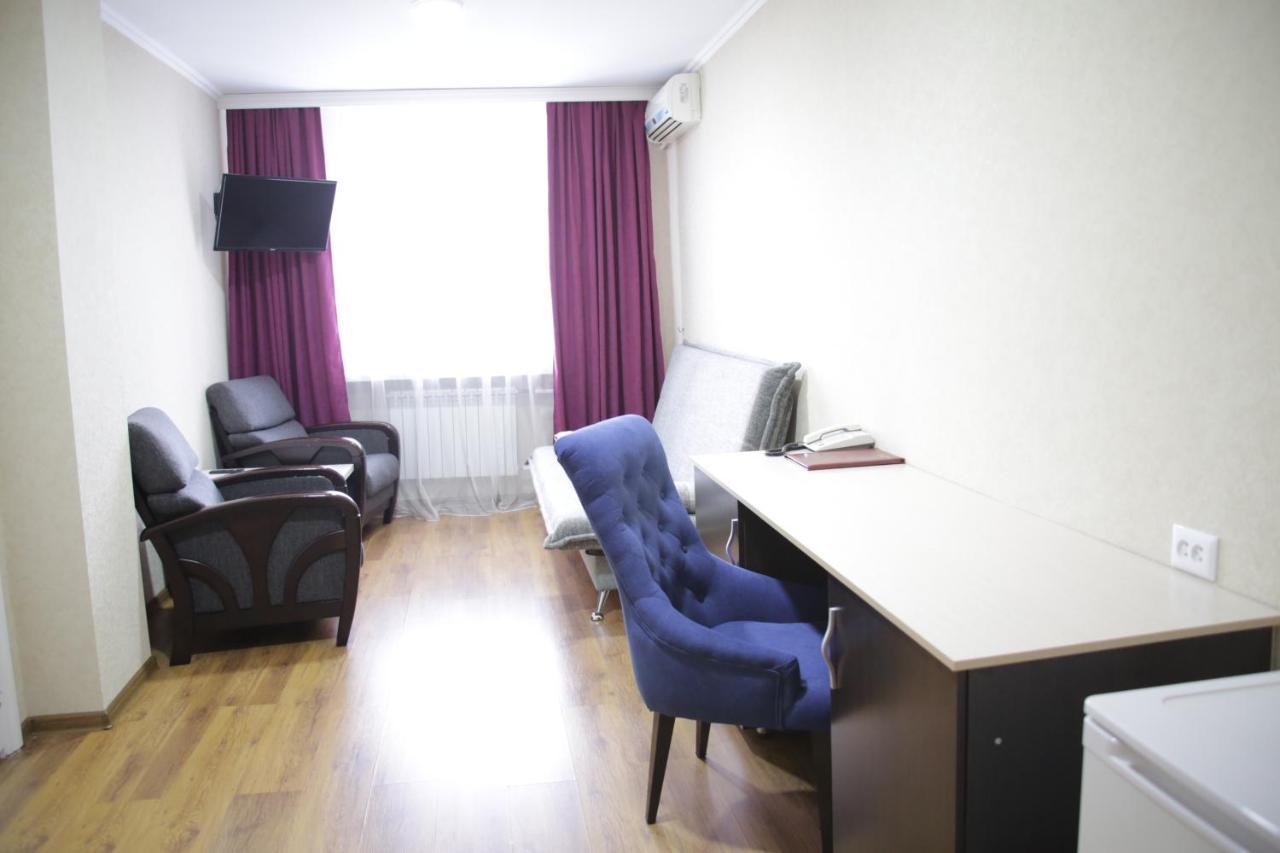 City Hotel Öskemen Bagian luar foto